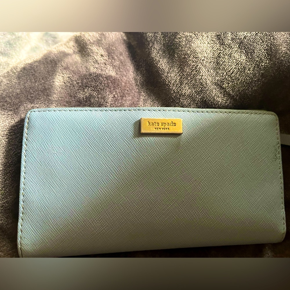 Light blue Kate Spade Wallet.
